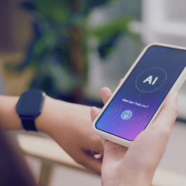 Person holding a phone with an AI interface displaying